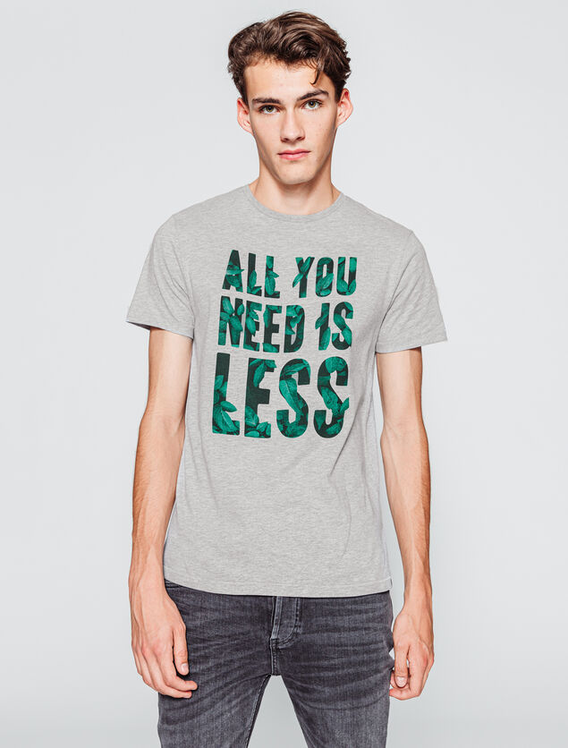 T-shirt à message  "ALL YOU NEED IS LESS"